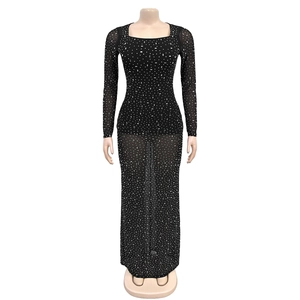 Detail view of black rhinestone long sleeve maxi dress with sheer mesh and square neck