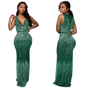 Deep V-neck dark green evening gown with shimmering sequins and bodycon fit detail
