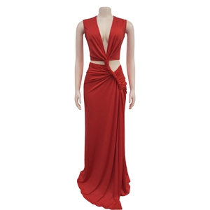 Detail of the elegant red deep V-neck dress featuring a twist knot waist cutout design