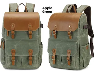 Vintage apple green canvas camera backpack with brown leather accents and straps