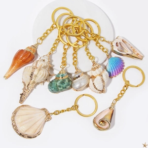 Set of 8 natural seashell and conch keychains with gold metal rings for beach accessories