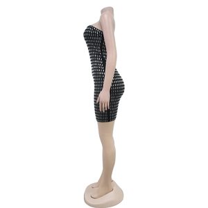 Detailed side view of black bodycon tube dress featuring shiny silver rectangle rhinestones