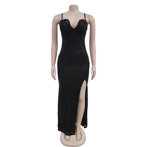 Detailed view of black sequined evening dress featuring deep V-neck and high side slit