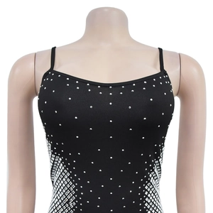 Detail of black camisole featuring silver rhinestone diamond patterns on side waist