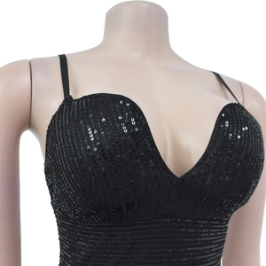 Close-up of black sequined V-neck dress with thin straps and vertical stripe texture