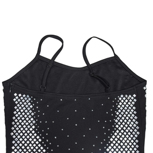 Detailed view of black dress featuring dense silver square rhinestones and side zipper