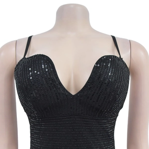 Close-up of deep V-neck black sequined evening dress with shimmering fabric detail