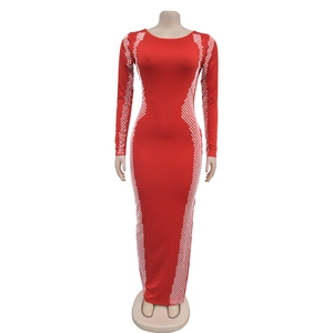 Detail of red bodycon maxi dress with long sleeves and white geometric dot patterns