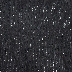 Detail of black mesh fabric featuring vertical stripes of silver C-shaped sequins