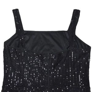 Close-up of black sequined dress featuring a square neckline and silver glitter stripes