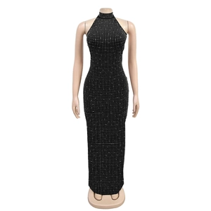 Detailed view of black bodycon maxi dress featuring all-over silver rhinestone embellishments