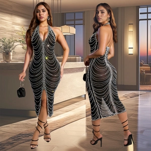 Elegant black halter evening dress with silver rhinestones and front slit detail
