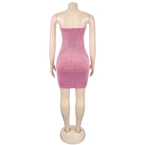 Detail of pink bodycon dress featuring vertical silver sequins and a back zipper closure