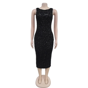 Detail of a black sleeveless midi dress with shimmering sequins and bodycon fit for parties