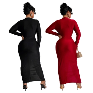 Detail view of bodycon long-sleeved dress with elegant side slit in black and burgundy