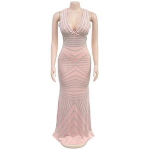 Macro detail of pink V-neck evening dress with silver rhinestone geometric patterns