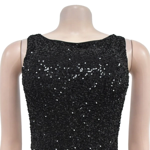 Close-up of black sequined sleeveless dress with shimmering round sequins and round neck