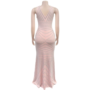 Detail of pink fisheye dress with silver rhinestone geometric patterns and V-neckline