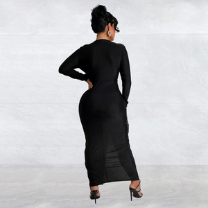 Rear view of a slim fit black long sleeve maxi dress with elegant floor length hem