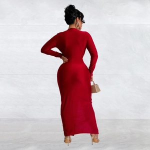 Deep red bodycon long-sleeve maxi dress with a sleek floor-length cut and smooth texture