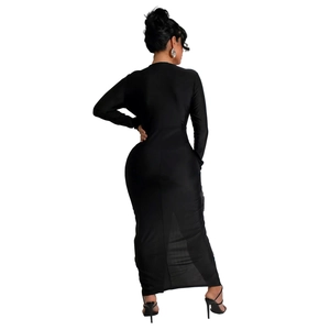 Detail view of the sleek back design and bodycon fit of this black V-neck maxi dress