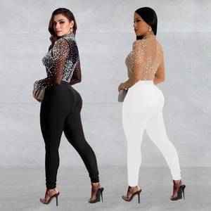 Mesh long sleeve jumpsuit set with rhinestones and slim fit design for parties
