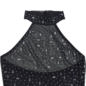Detail of black mesh halter neck top with sparkling silver rhinestones and sequins