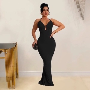 Close-up of elegant halter neck maxi dress with cutout detail and metal buckle