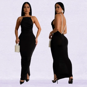 Elegant black halter evening dress with pearl straps and sexy backless detail