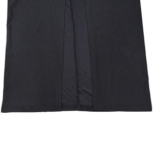 Detailed close-up of the side slit design and stitching on a black V-neck fitted dress