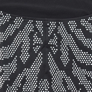 Macro detail of high-stretch fabric featuring elegant wave-pattern silver rhinestone inlay