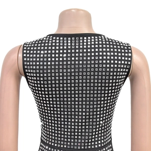 Close-up of black bodycon dress back featuring sparkling square rhinestone embellishments