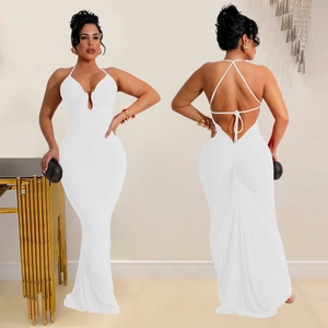 Detail view of white halter neck maxi dress with backless design and V-neck pleats