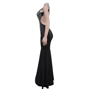 Detail of black mermaid dress with silver rhinestones and open back design