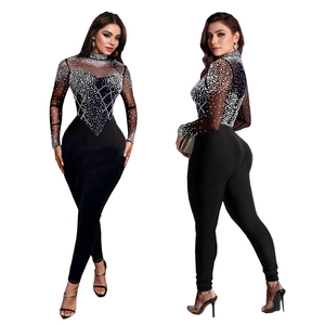 Detail of sheer mesh bodysuit with rhinestones, showing front and back views in black