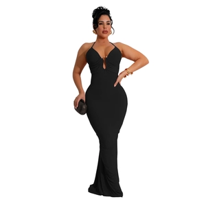 Detail view of deep V-neckline with metal buckle and cutout on black halter maxi dress