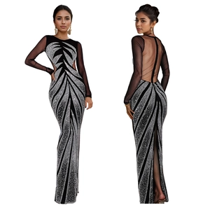 Elegant black bodycon dress with silver sequins, mesh long sleeves and an open back