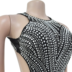 Close-up of geometric rhinestone patterns on a black sleeveless backless mermaid dress