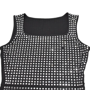 Detailed view of silver square rhinestones on the square neck of a black evening dress