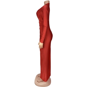 Detail of red bodycon maxi dress featuring side ruched seams and elegant V-neck design