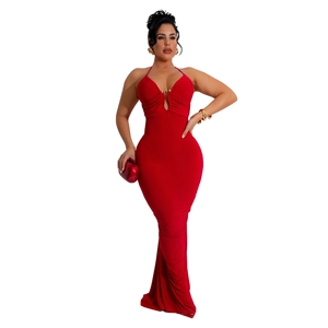 Detail of red bodycon maxi dress with deep V-neck, halter design, and metal ring detail