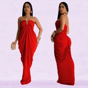 Detail of red V-cut neck strapless evening dress featuring elegant draped pleats