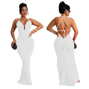 Detail of white long evening dress with deep V-neck, backless design and fishtail silhouette