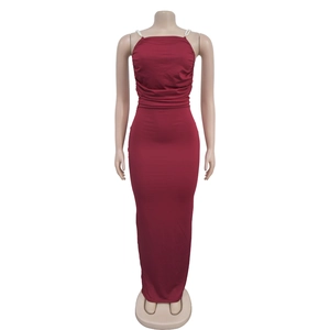 Detail of burgundy bodycon maxi dress featuring elegant pearl bead thin shoulder straps