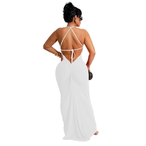 Detail of white ruched back design on backless maxi dress with cross tie-up straps