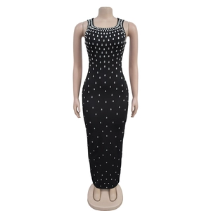 Close-up of sparkling rhinestone details on elegant black sleeveless bodycon dress