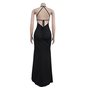 Detail of cross strappy back and ruched design on slim fit black maxi dress