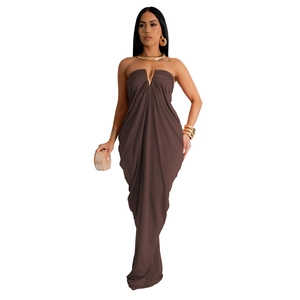 Detail of deep brown strapless maxi dress with V-shaped metal hardware and pleated bust