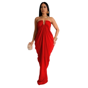 Close-up of elegant red maxi dress featuring a chic gold metal V-bar hardware detail