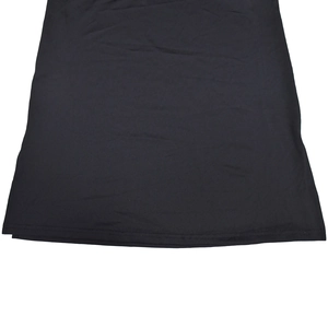 Detailed close-up showing the double-stitched hem on the black knitted dress fabric
